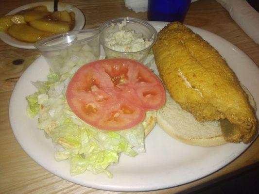 Flounder sandwich with a side of apples