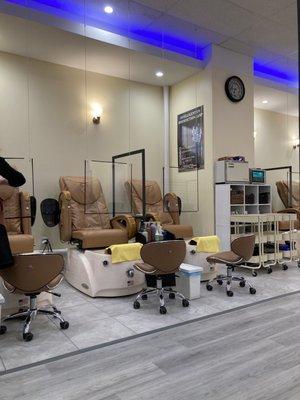 Pedicure/massage chairs Perfectly distanced and situated.