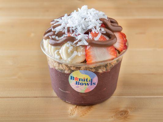 BONITA BOWL - ACAI BASE TOPPED WITH GRANOLA, STRAWBERRY, BANANA, NUTELLA, & COCONUT FLAKES