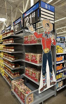 Howdy Folks! Big Tex display with Lone Star beer and chips and salsa nearby.