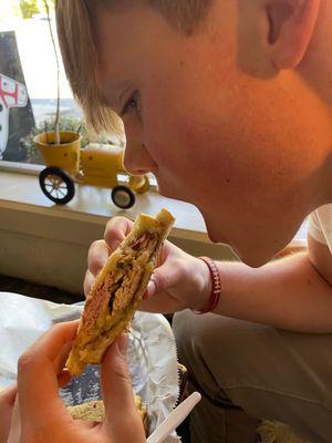 My happy son loving the food