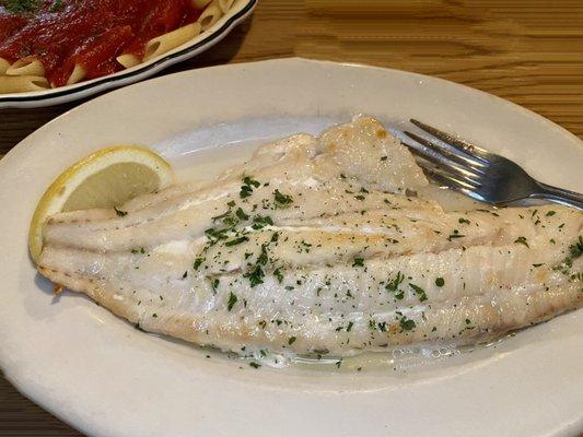 Broiled Haddock with side of pasta.