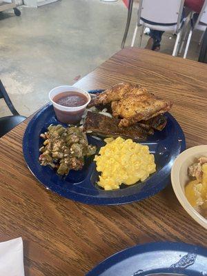 Chicken with pork ribs plate with okra gumbo and mac and cheese. The ribs fall right off the bone!