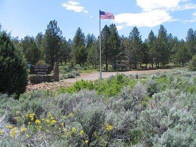 Upon leaving Hwy 139, drive about 1/4 mile and you'll see the flag at the entrance.