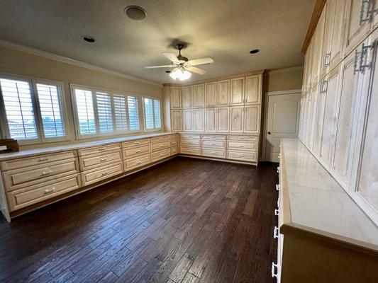 Custom built cabinets and hardwood floor installation