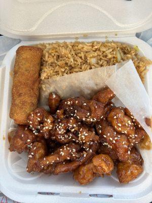 Sesame chicken with fried rice and chicken egg roll