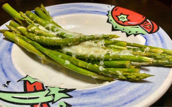 Fresh asparagus with cheese.