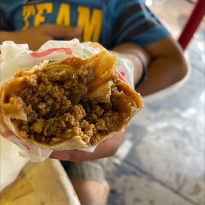 Inside of beef burrito (green sauce)