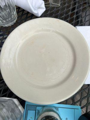 Dirty plates we were handed for our bread