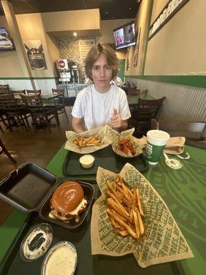 a boy enjoying his food