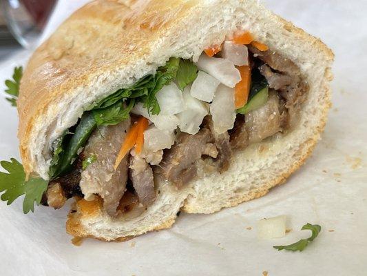 The grilled pork sandwich. This is how much meat you get in a sandwich.