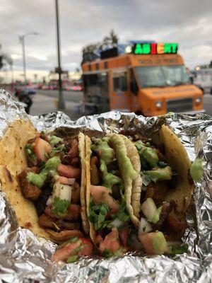 3 pastor tacos with some added toppings