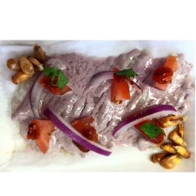 Olive aioli tiradito/ sashimi with tomatoes and onions!