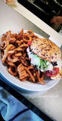 Cajun Chicken Breast Sandwich with curly Fries