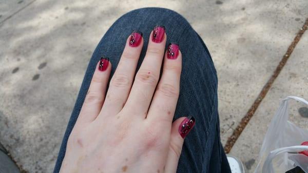 My fixed nails with a lovely design I found online that Cindy copied and improved upon for me.