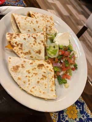 Steak and Chicken Quesadilla from the A La Carte Menu served with fresh Pico de Gallo, and sour cream