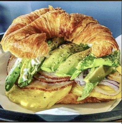 Turkey, egg, avocado croissant breakfast sandwich