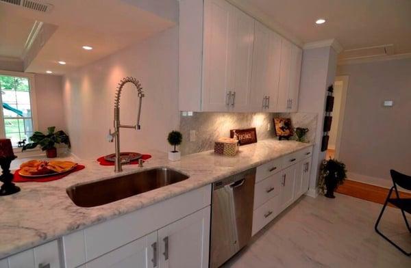 Cararra White Marble Countertops along with back Splash in My Houston Home.