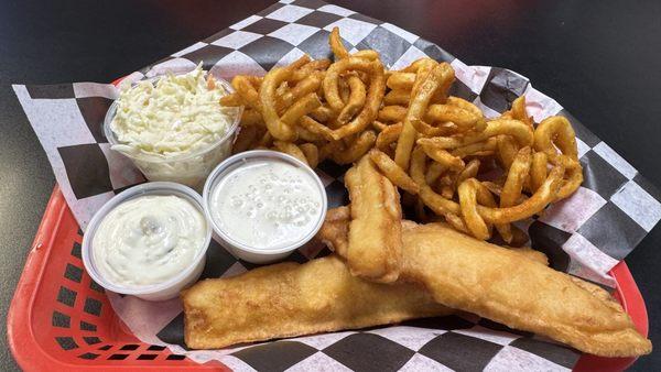 Catfish basket with curley fries, Cole slaw, tartar sauce, and ranch to dip the fries