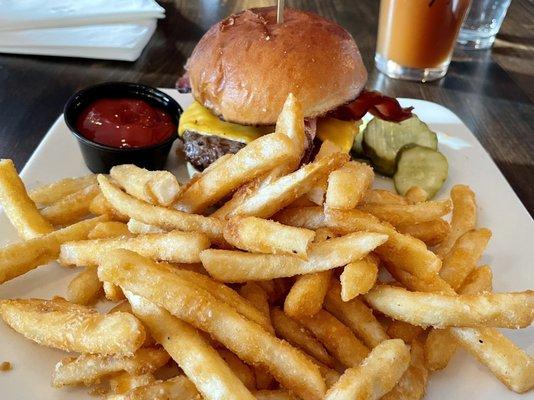 Bacon cheeseburger and a mountain of French fries