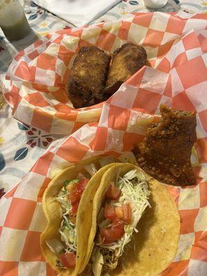 Tacos, Pastelilla, and Barria egg rolls.