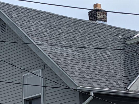 Replaced blown off shingles on this home.