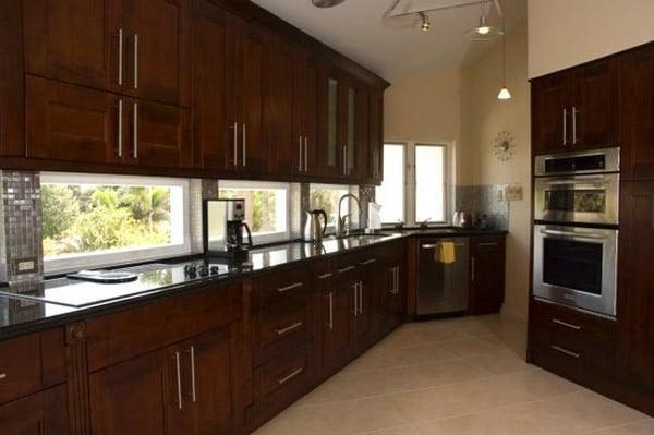 Elegant Espresso Mocha Shaker style cabinets with straight line door handles