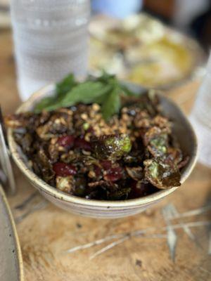 Crispy Brussels Pickled cranberries, date molasses, crispy garlic