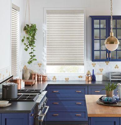 Custom faux wood blinds installation for modern casual kitchen.