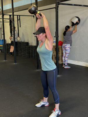 Tiff swining a kettlebell