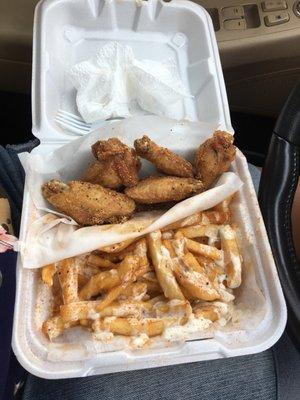 6 piece rogo (rosemary and garlic) wings, Cajun ranch fries, and a ghetto punch (not pictured)