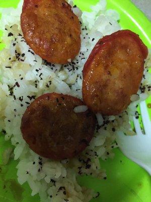 Cooked package of sausage, with rice, shoyu, & shiso furikake. So Ono!!