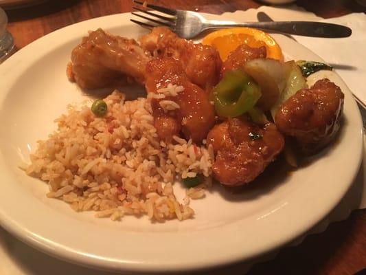 Orange chicken, almond chicken, General tso chicken and fried rice.