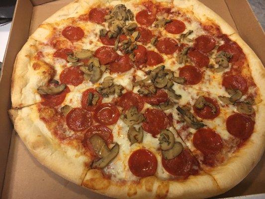 Medium pepperoni mushroom. Medium is the size of most larges.