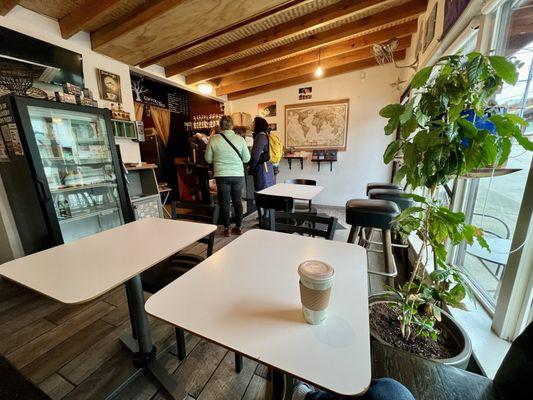 Total seating: Three small tables, three counter seats, a few outdoor tables on busy 10th Av E. There's a bathroom out of photo at left.