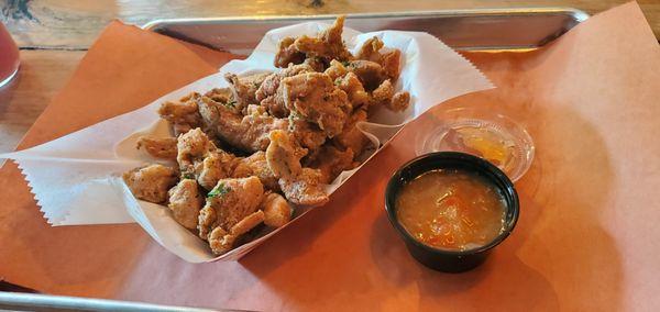 Popcorn Chicken with Pineapple Habanero dipping sauce.