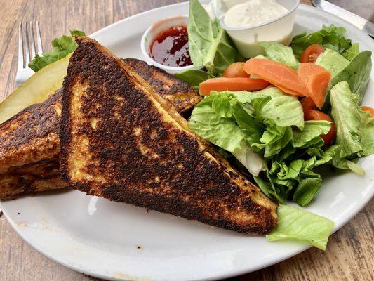 Monte Cristo w/green Chile, side salad and raspberry sauce