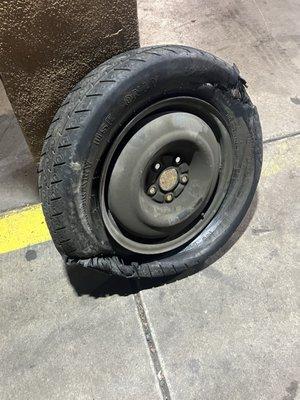 my spare that blew attached to my rim. the spare they tried to sell us looked exactly like this (minus the blow out lolol)