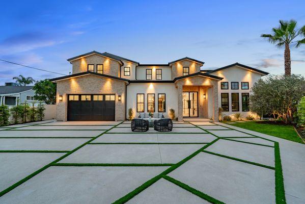 Stunning new construction with sleek modern design and exceptional curb appeal.