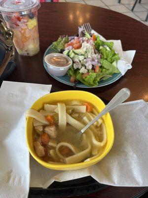 Soup and salad combo, plus fruit cup. Chicken salad (salad), and chicken noodle soup