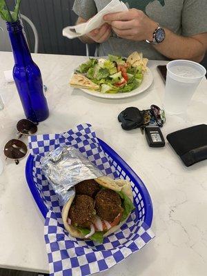 Falafel pita and Greek salad