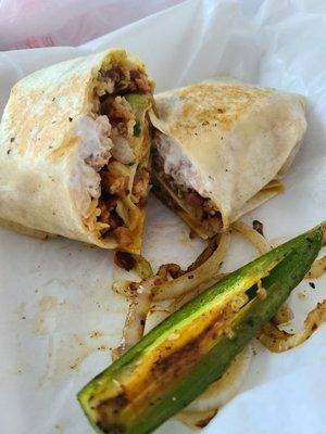 Pastor burrito with grilled onions and jalapeño