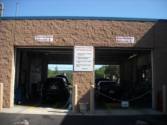 Welcome to our Express Lube where we can change your oil in 15 minutes!