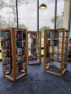 Honor system books located on rolling racks.