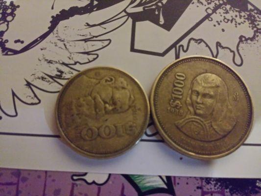 Peso coins.  One is 100 other is 1000. What is it worth