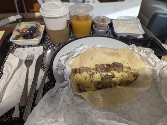 Breakfast tacos (2) , with yogurt with blue berries and oats, and a fruit salad!