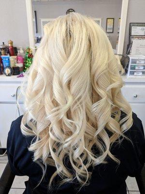 Black to platinum blonde and loose curls done by Diana