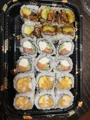 Eel Avocado Roll, Philadelphia Roll, and Spicy Shrimp with Mango Roll