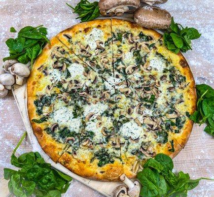 The White pizza! Alfredo sauce base, topped with our finest mushrooms, mozzarella, ricotta, spinach, and an olive oil drizzle.