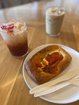 Strawberry hibiscus Thai tea, iced latte and tomato and cheese croissant